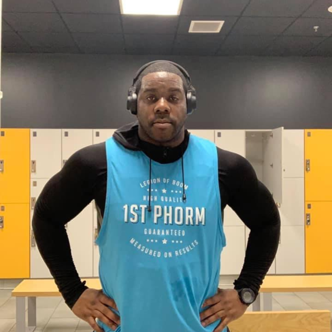 Coach Keith Lockwood wearing a Body Restoration Club shirt